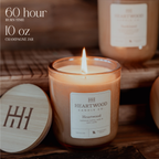 Lit 10 oz hand-poured soy candle with wooden lid and 60+ hour burn time